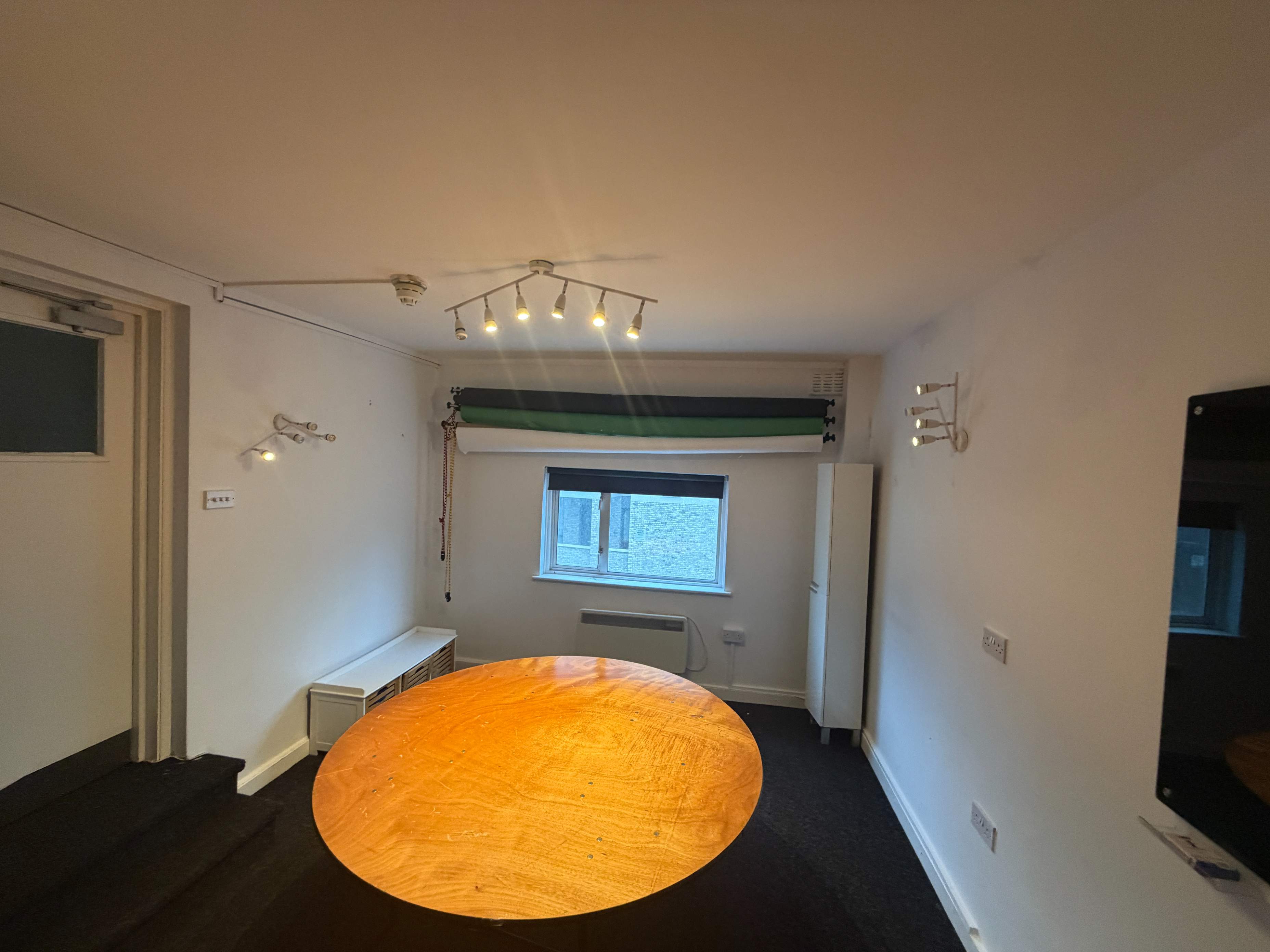 Meeting room with table and window at Bradfield Club Peckham