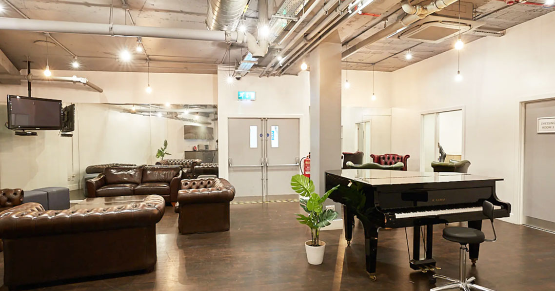 Stylish Central London meeting room for hire featuring a cool industrial feel, perfect for creative workshops.