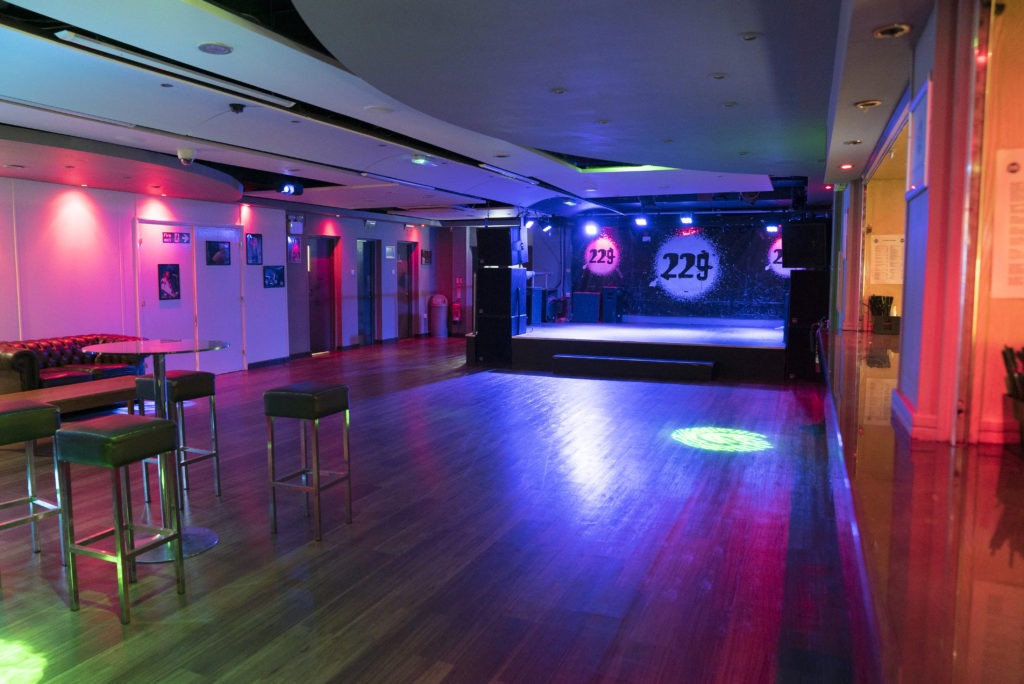 Empty dance floor at Venue 2 ISH Venues with blue and purple mood lighting, available for club night and performance hire London