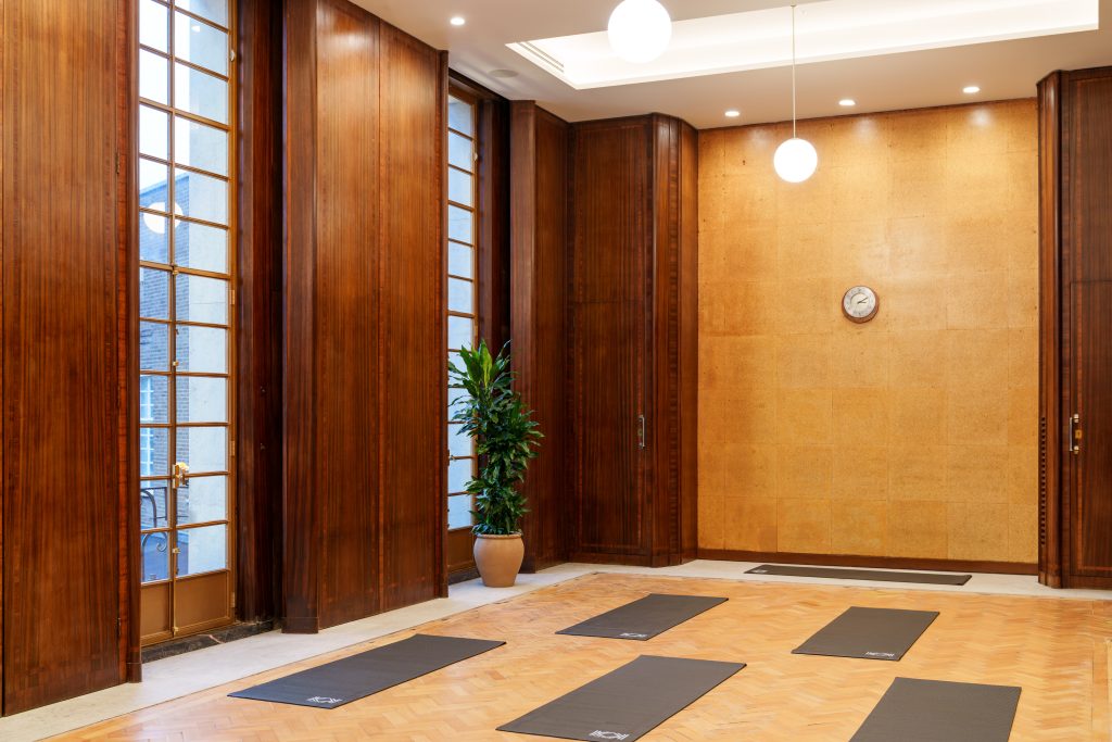 Committee Room at Hornsey Town Hall configured for a wellness session, showcasing its flexible layout as a versatile Hornsey event space