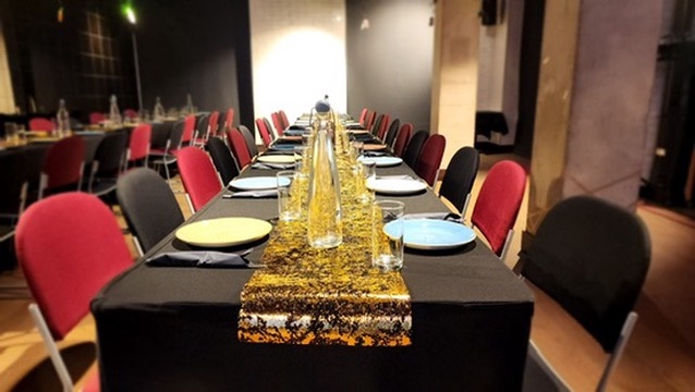 A lavishly decorated dining table with golden centrepieces set up inside Om Nom Studio, perfect for private dining, weddings, and celebrations in Isli