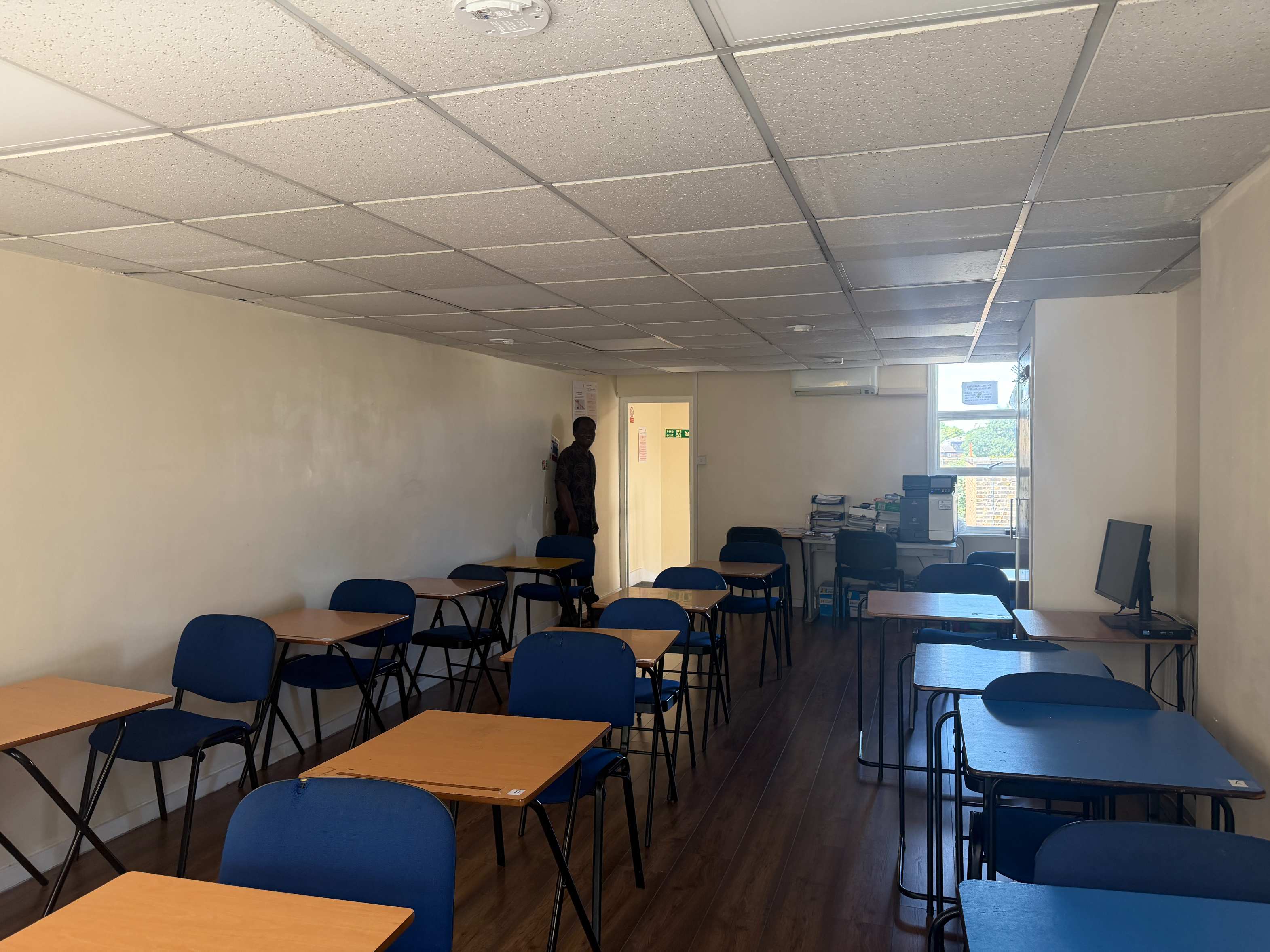 Interior view of Study Room 2, Walworth — desks facing the entrance with natural light from windows
