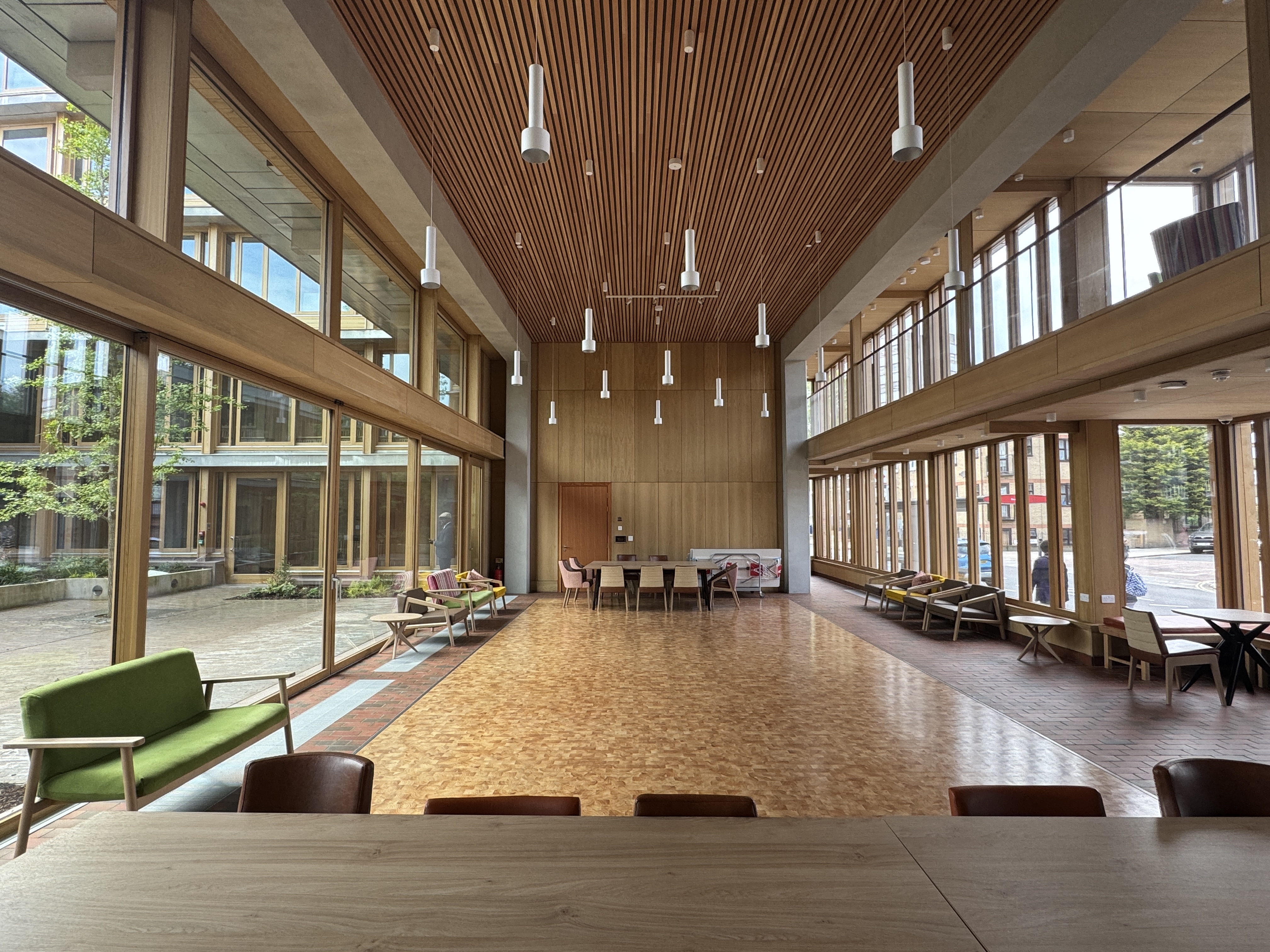 Garden Room at Appleby Blue, 100-capacity, with floor-to-ceiling windows, parquet floor, and modern lounge seating, book via Conveenie.