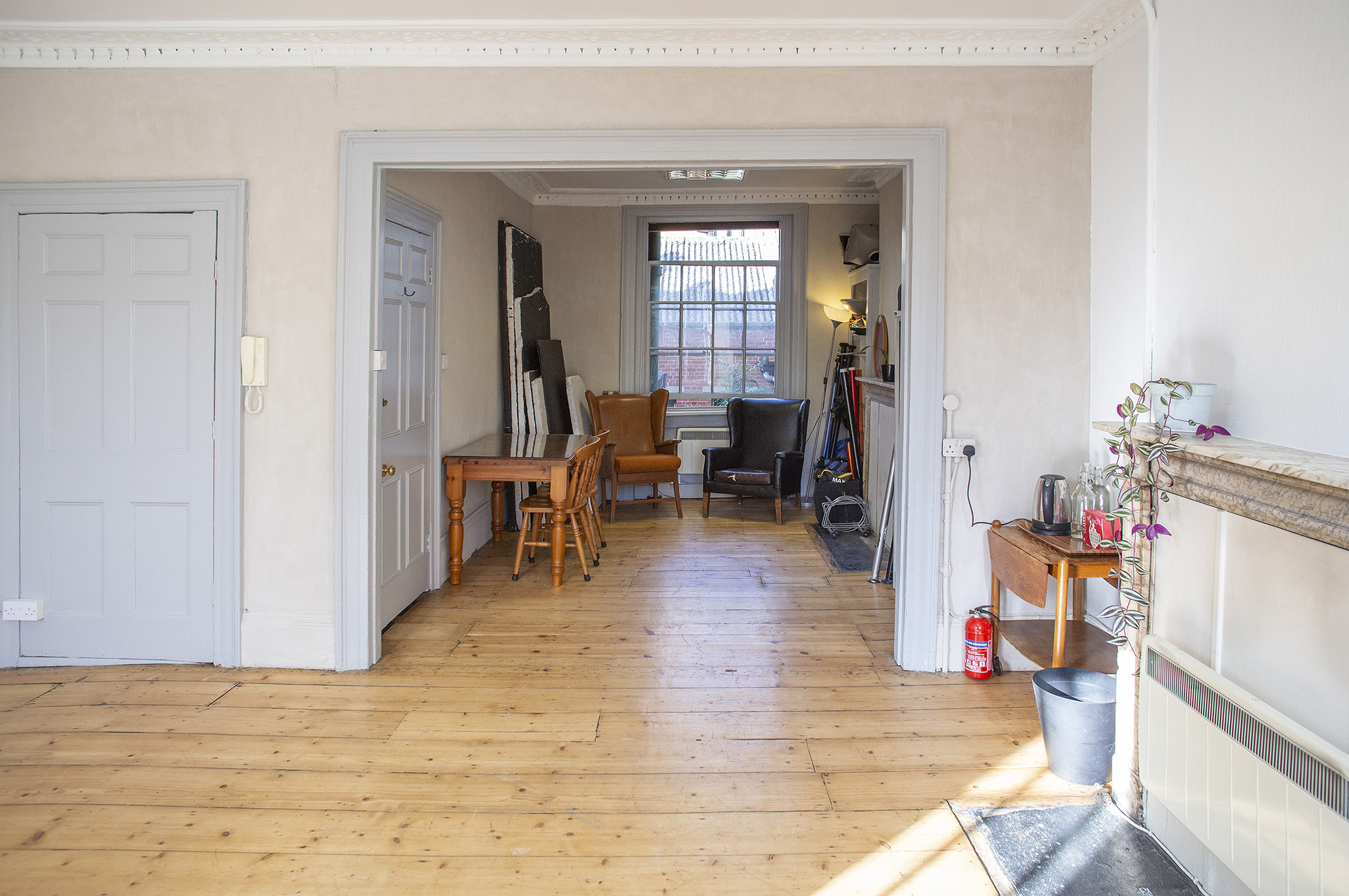 The Studio at Anomalous Space, London, a natural light photography and film studio for 15 with wood floors and blank canvas feel.