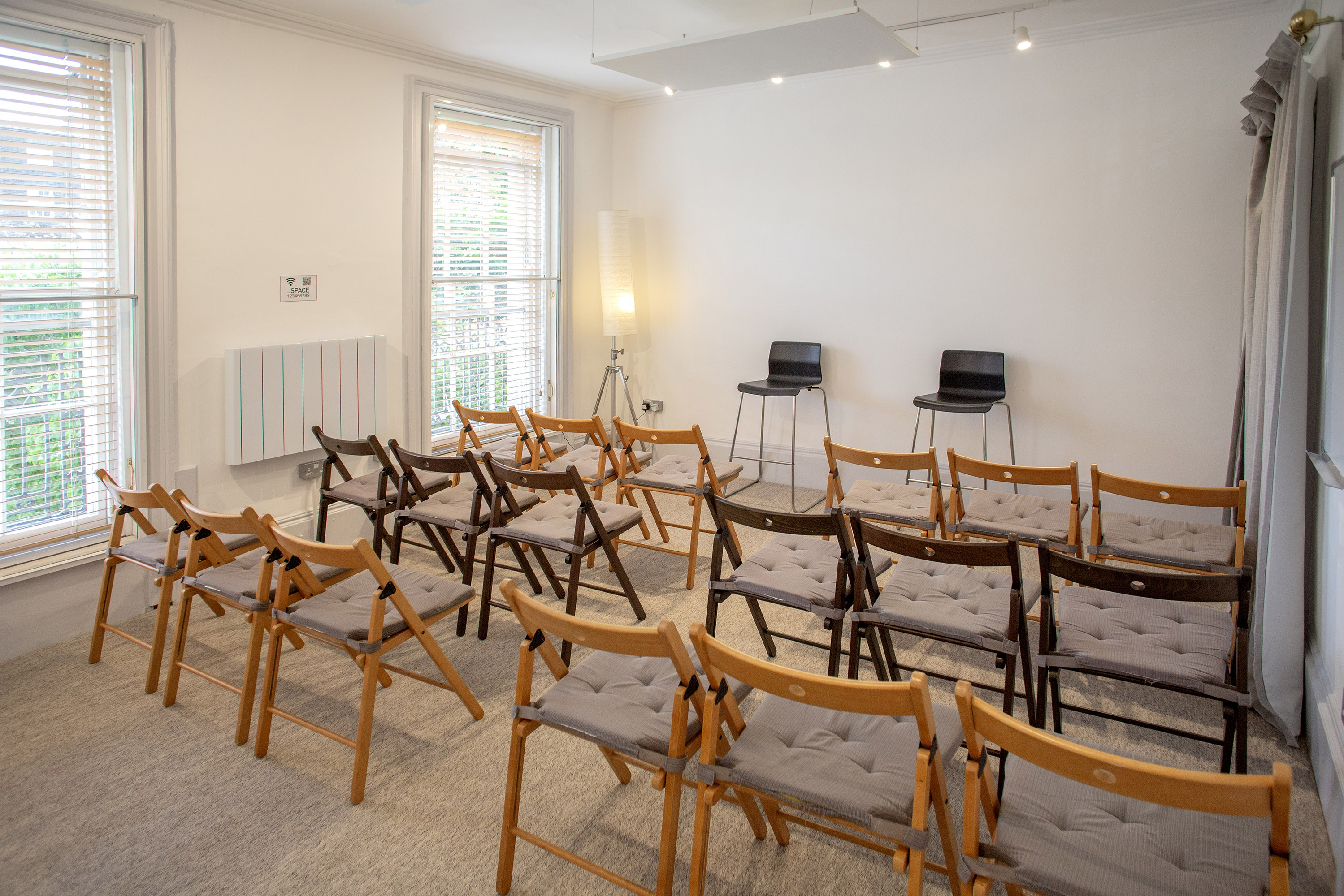 The Flat at Anomalous Space, London, a bright meeting room for 30, set theater-style, ideal for workshops and presentations.