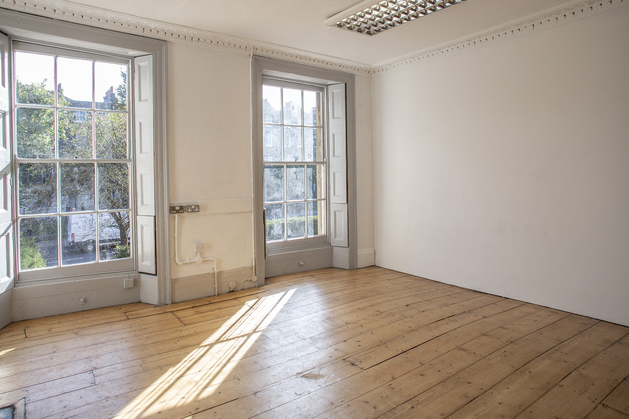 Spacious room hire in London at Anomalous Space, a bright, blank canvas studio with wooden floors, great for pop-up meetings.