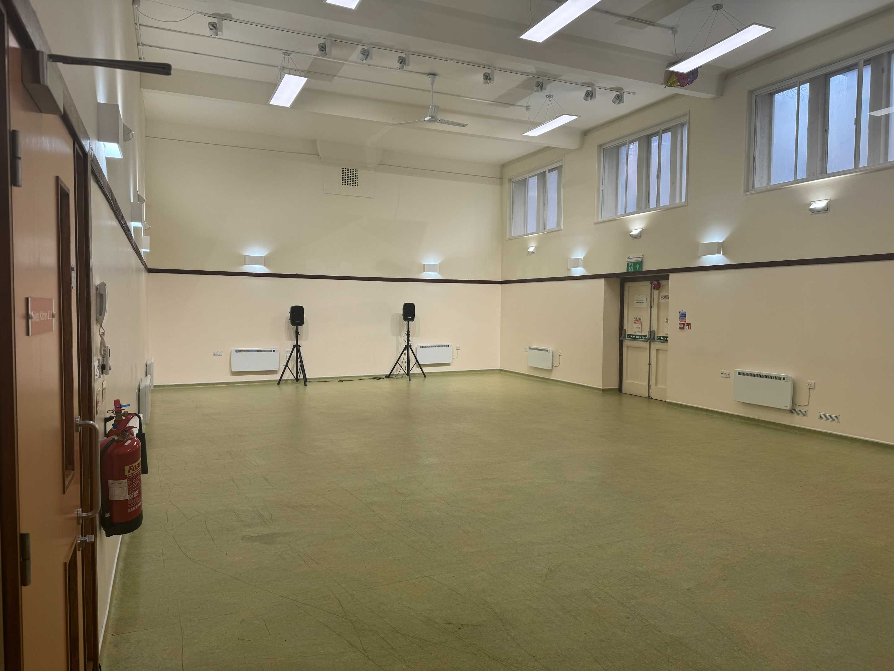 Spacious hall at St John's Centre in Elephant & Castle with clean wooden flooring and versatile layout