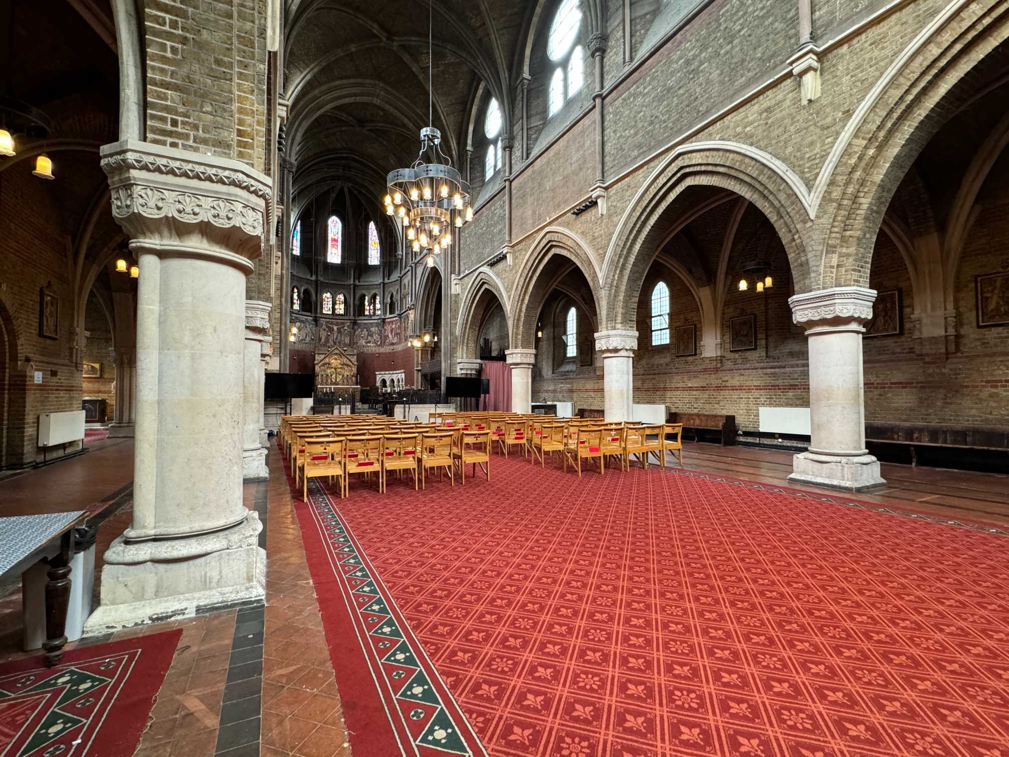 Wide-angle interior shot of St Peters Church in Vauxhall showing its grandeur, charm and full event capacity