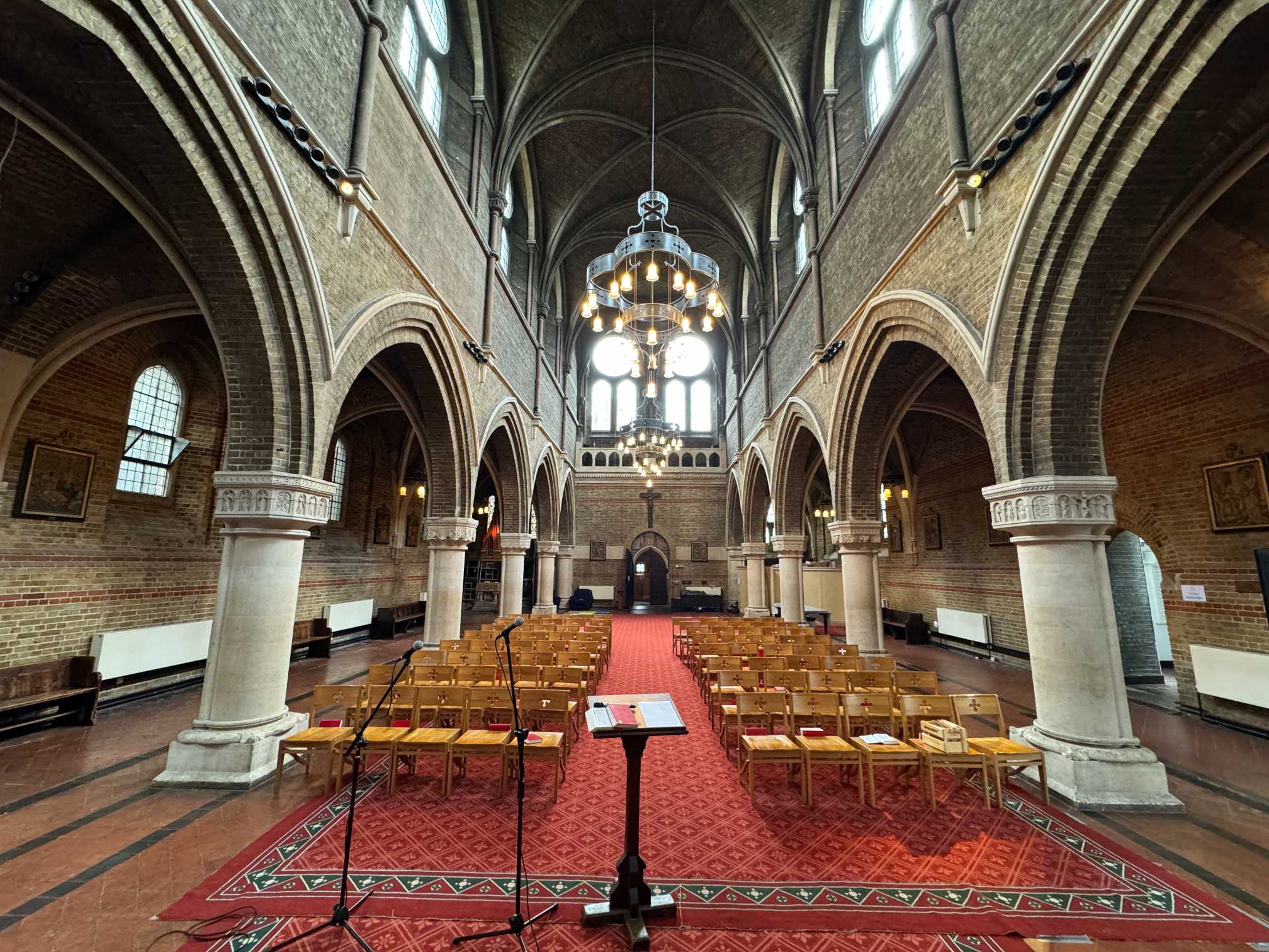 Rooftop view of St Peters Vauxhall revealing spires and stonework of this timeless venue via Conveenie