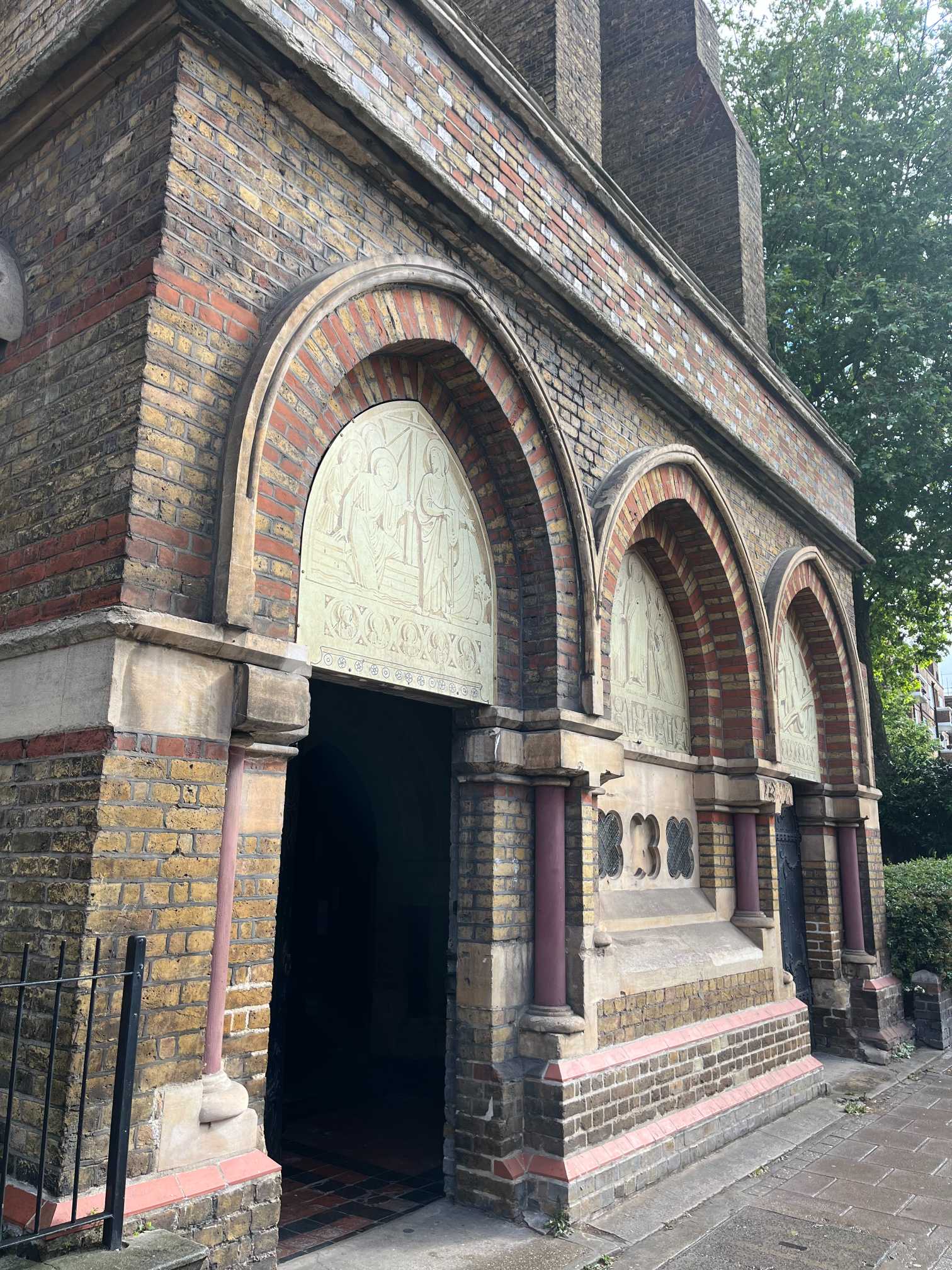 Ambient view of St Peters Church bathed in natural light with high ceilings and ornate Gothic features