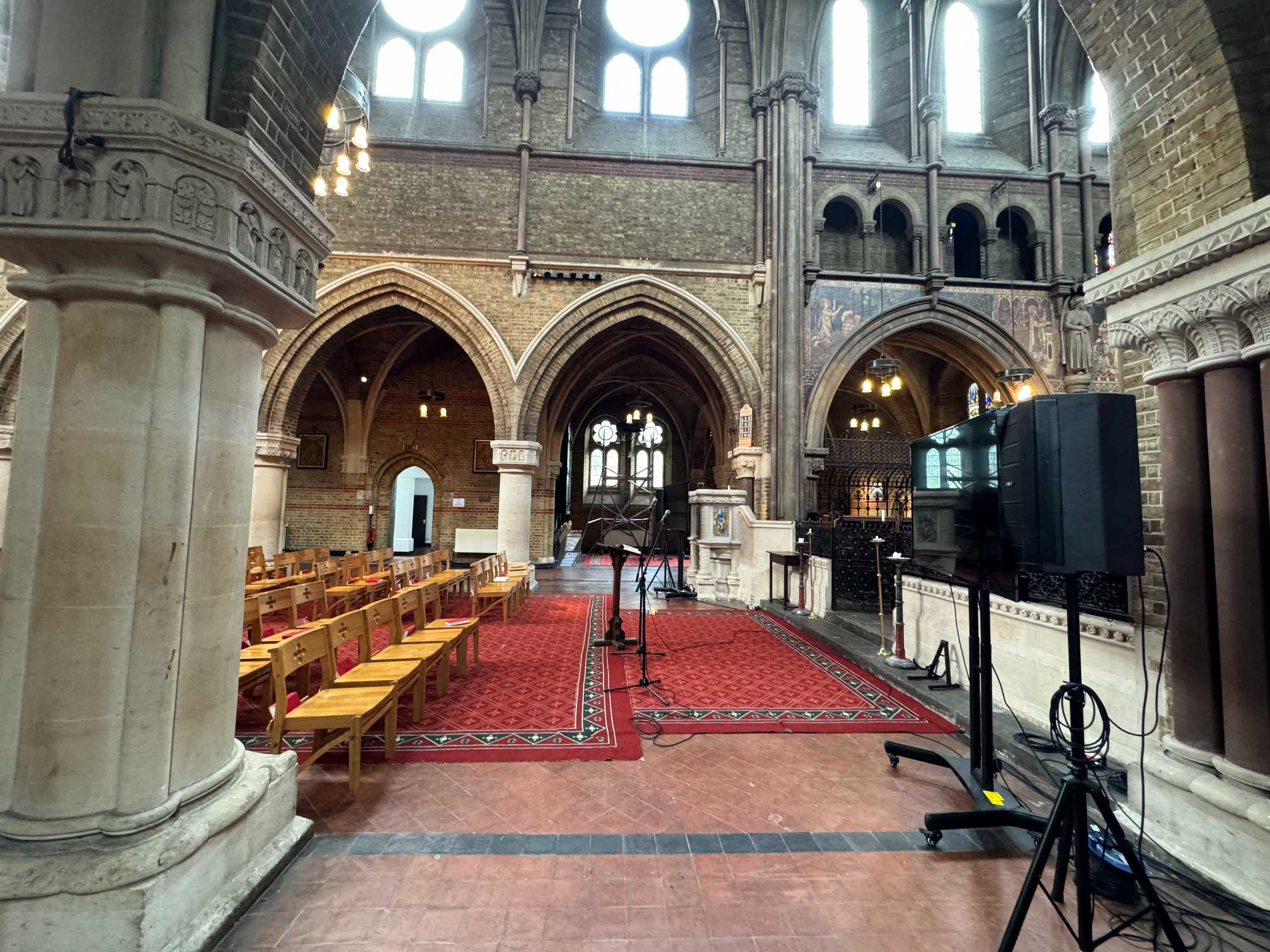 Stage view at St Peters Vauxhall featuring rich acoustics and a backdrop of Gothic detailing ideal for performances