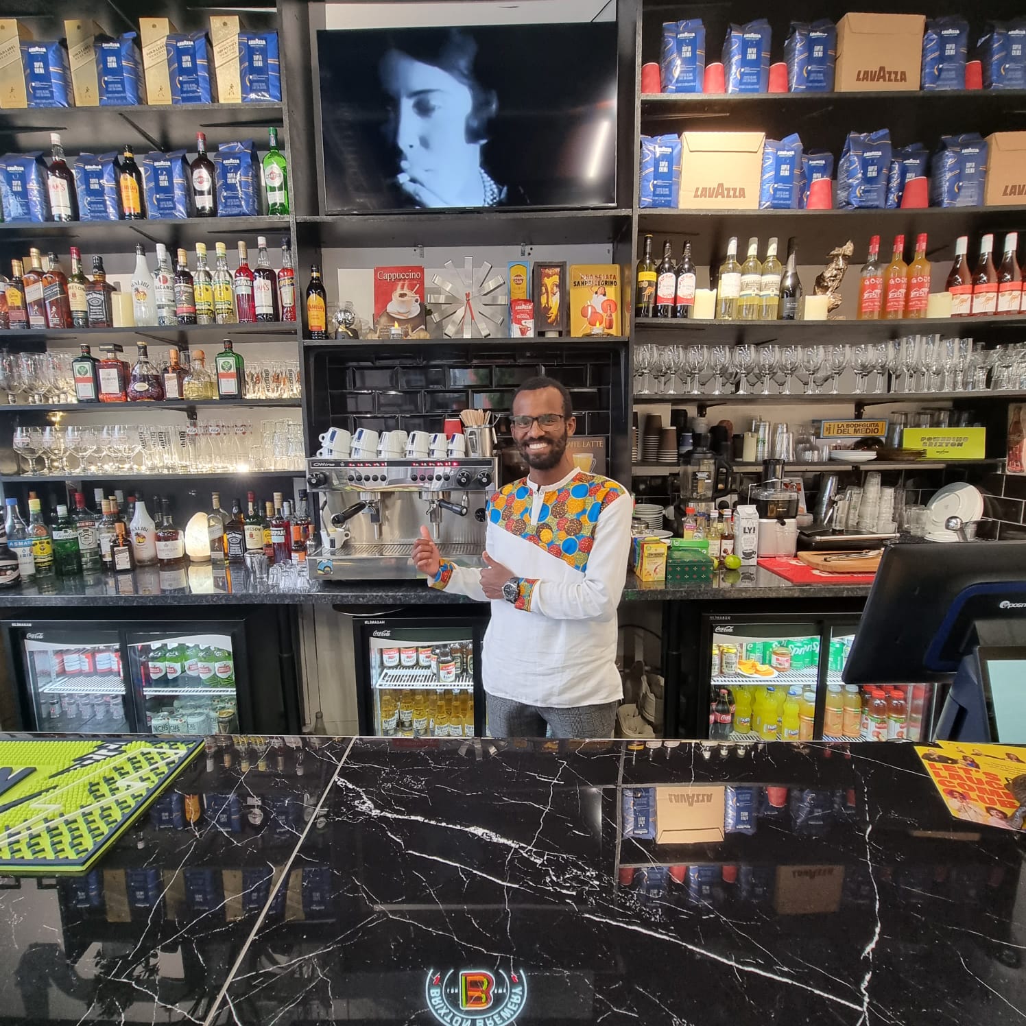 Bar and juice counter view at Brixtonia Lounge in Brixton—offering fresh drinks, music and good vibes