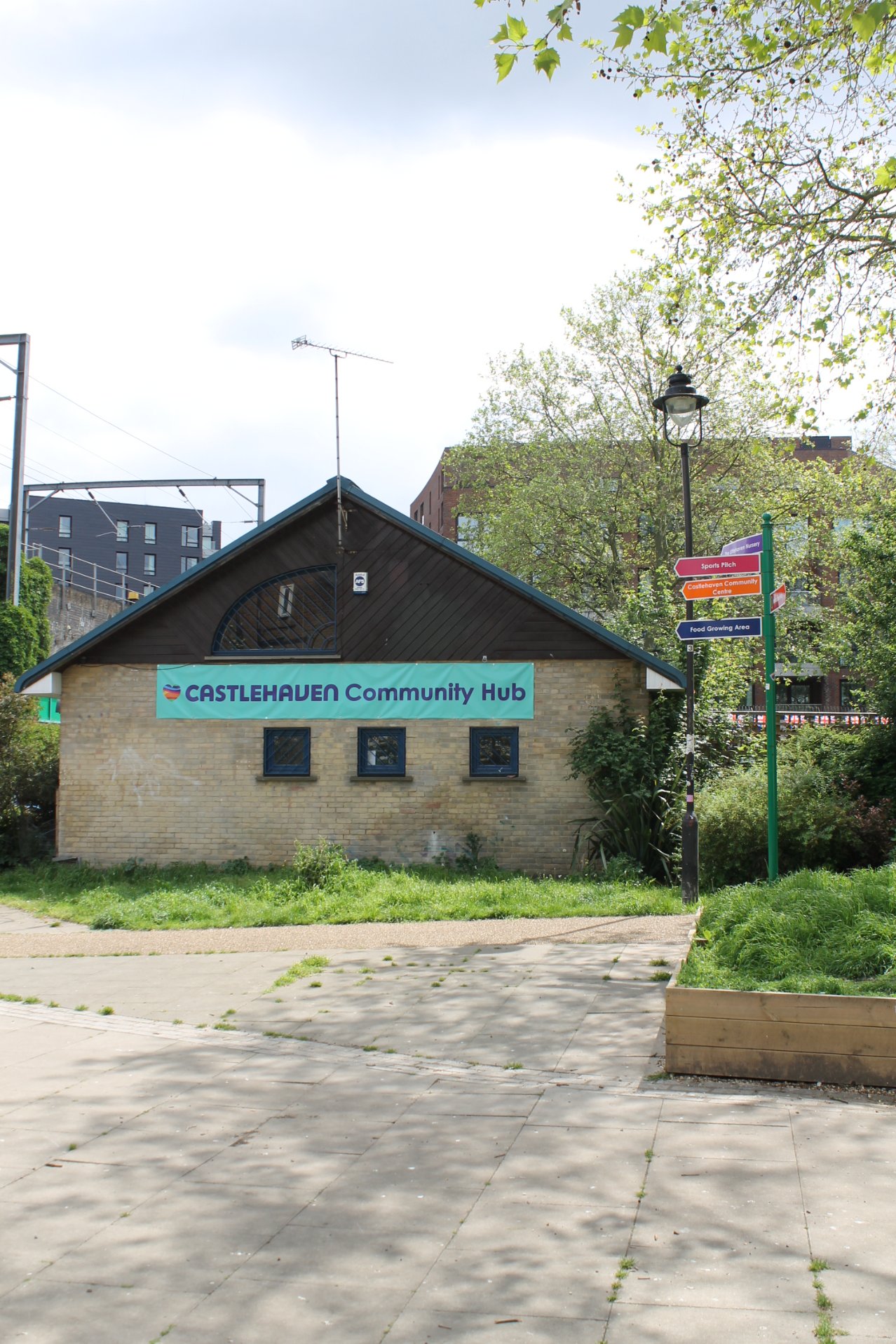 Front garden and exterior view of Castlehaven venue, ideal for both indoor and outdoor community events.