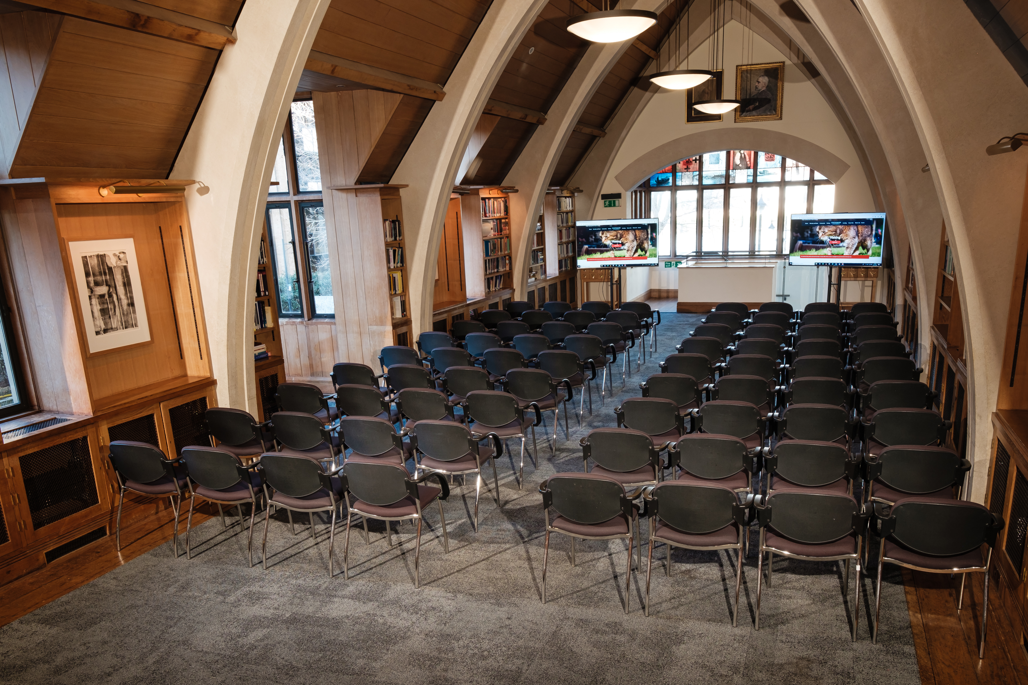 Wide-angle library view with flexible layout for up to 120 guests—ideal for receptions or professional events