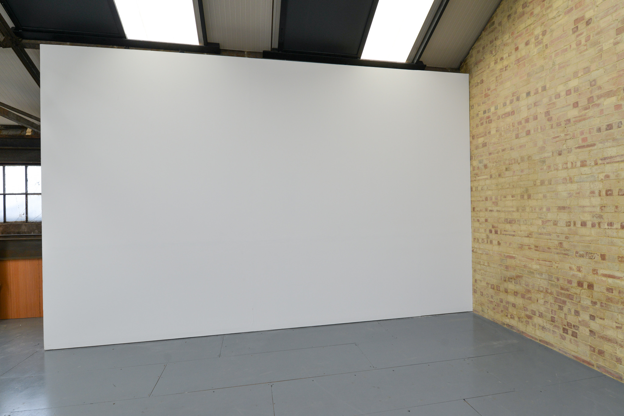 Projector and screen setup at Rocketvan Studio in Elephant and Castle, ready for workshops or presentations