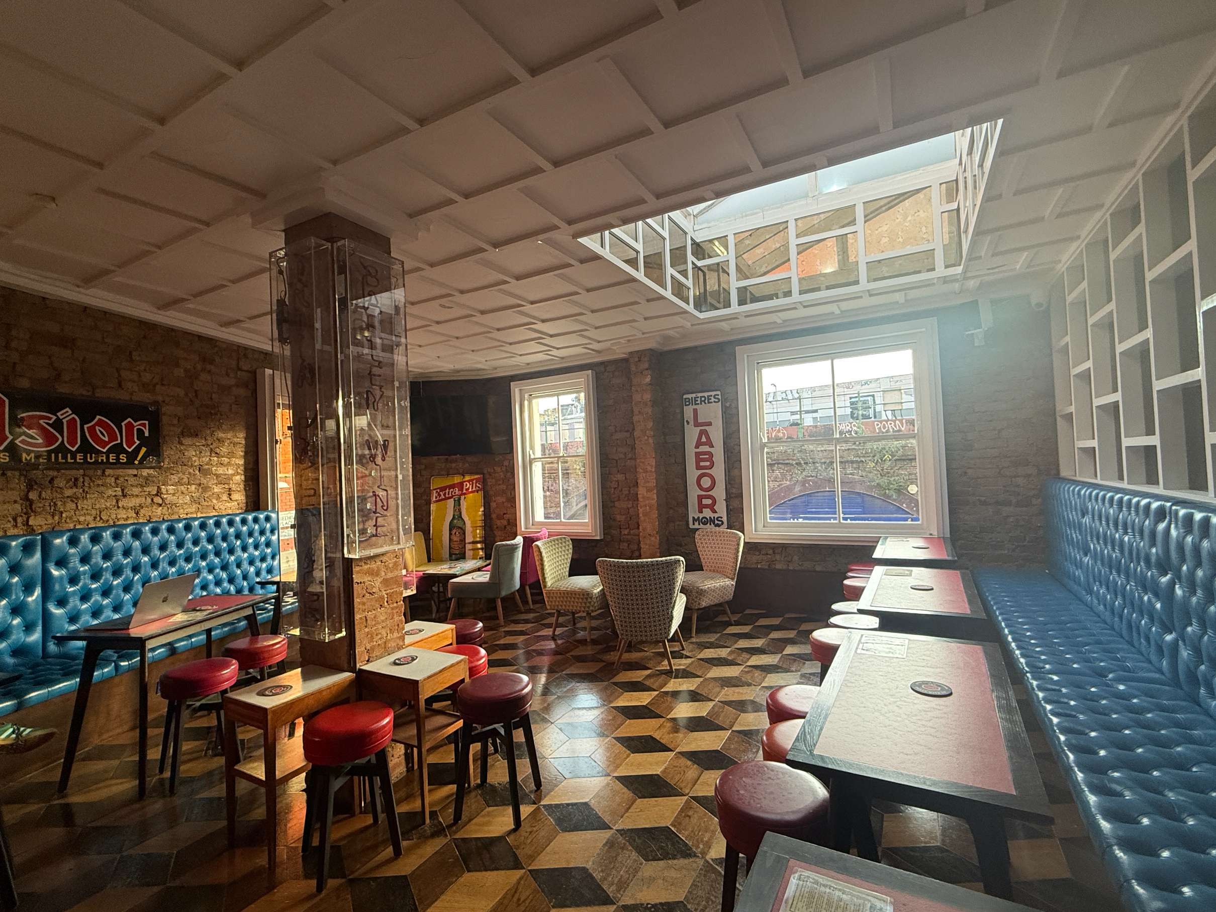 Seating area inside Craft Beer Co. Brixton, a Conveenie-listed venue ideal for private gatherings and shoots