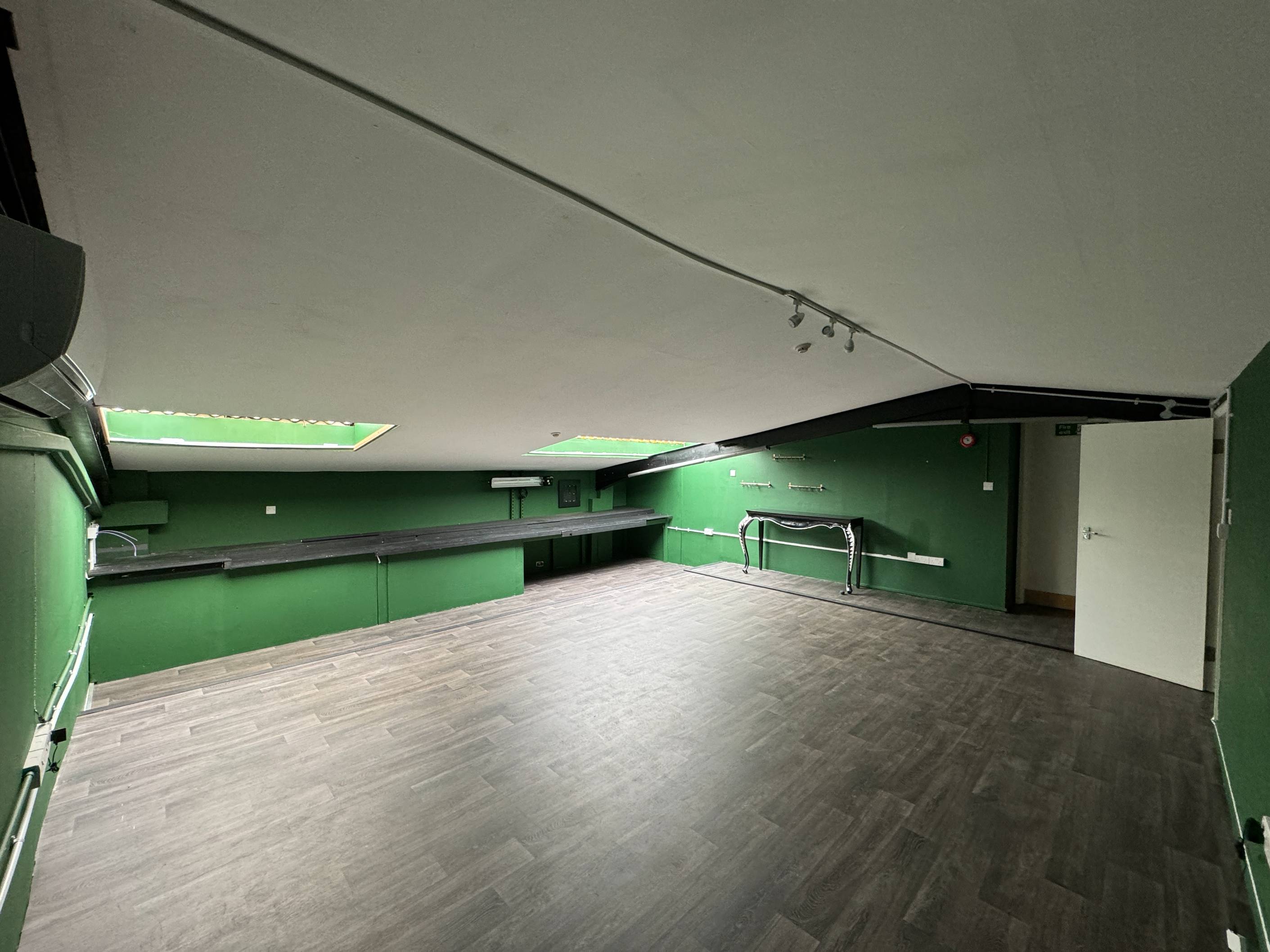 Spacious 25-person venue at Autumn Studios in Hackney Wick, featuring simple décor and soft daylight.